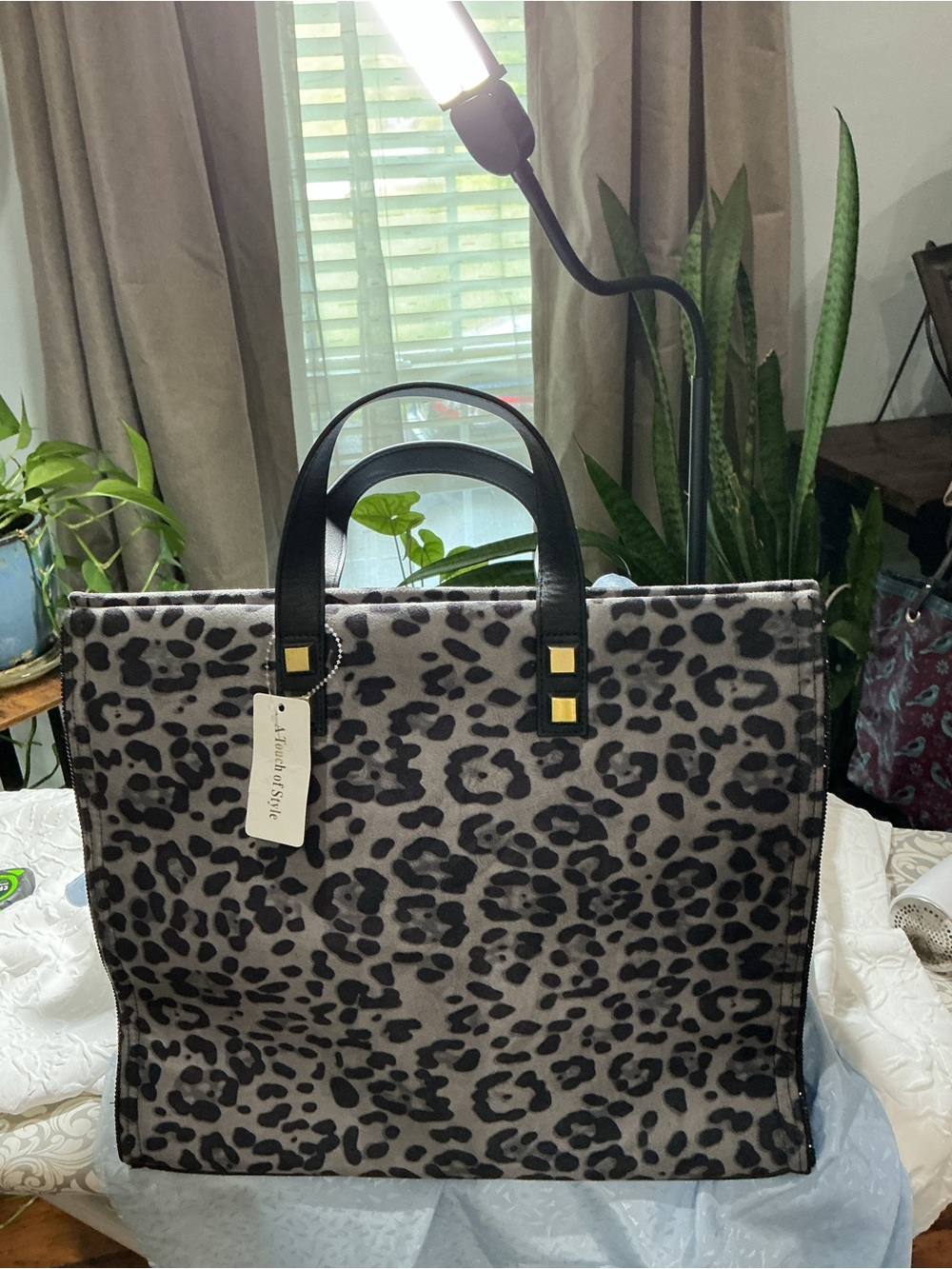 Leopard Pattern Tote with Black Handles and Gold Accents